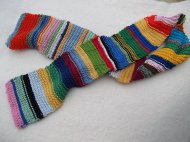 a garter stitch scarf, made from embroidery thread